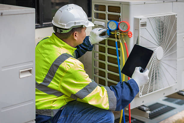 Professional Hvac technician working in Mandeville, LA
